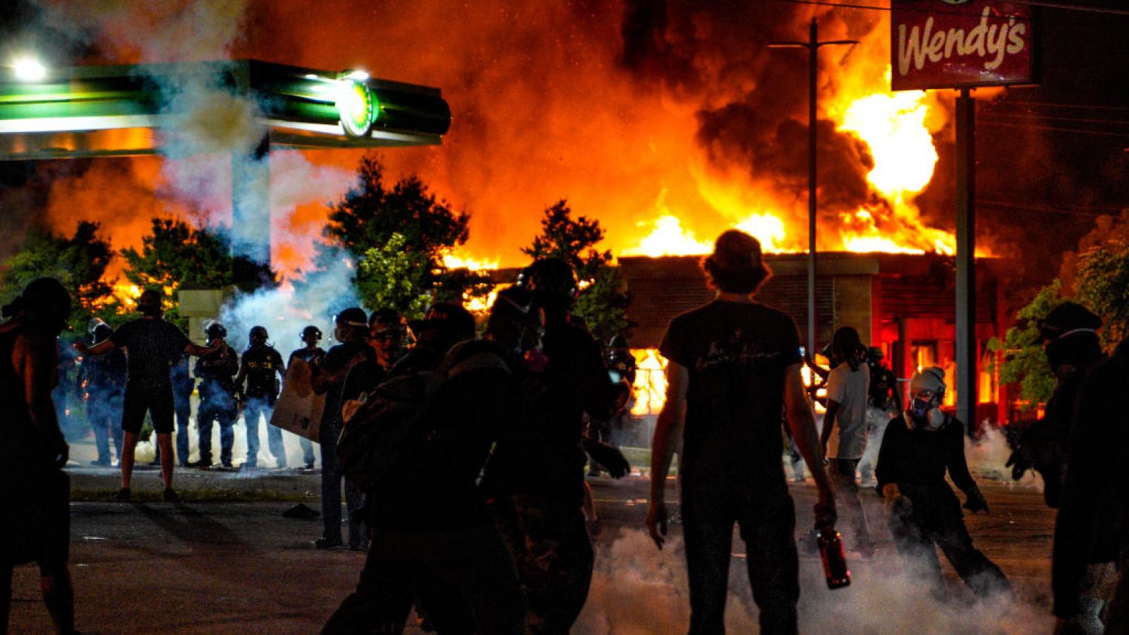 Demonstrators set fire to a Wendy's in Atlanta, Georgia following the death of Rayshard Brooks