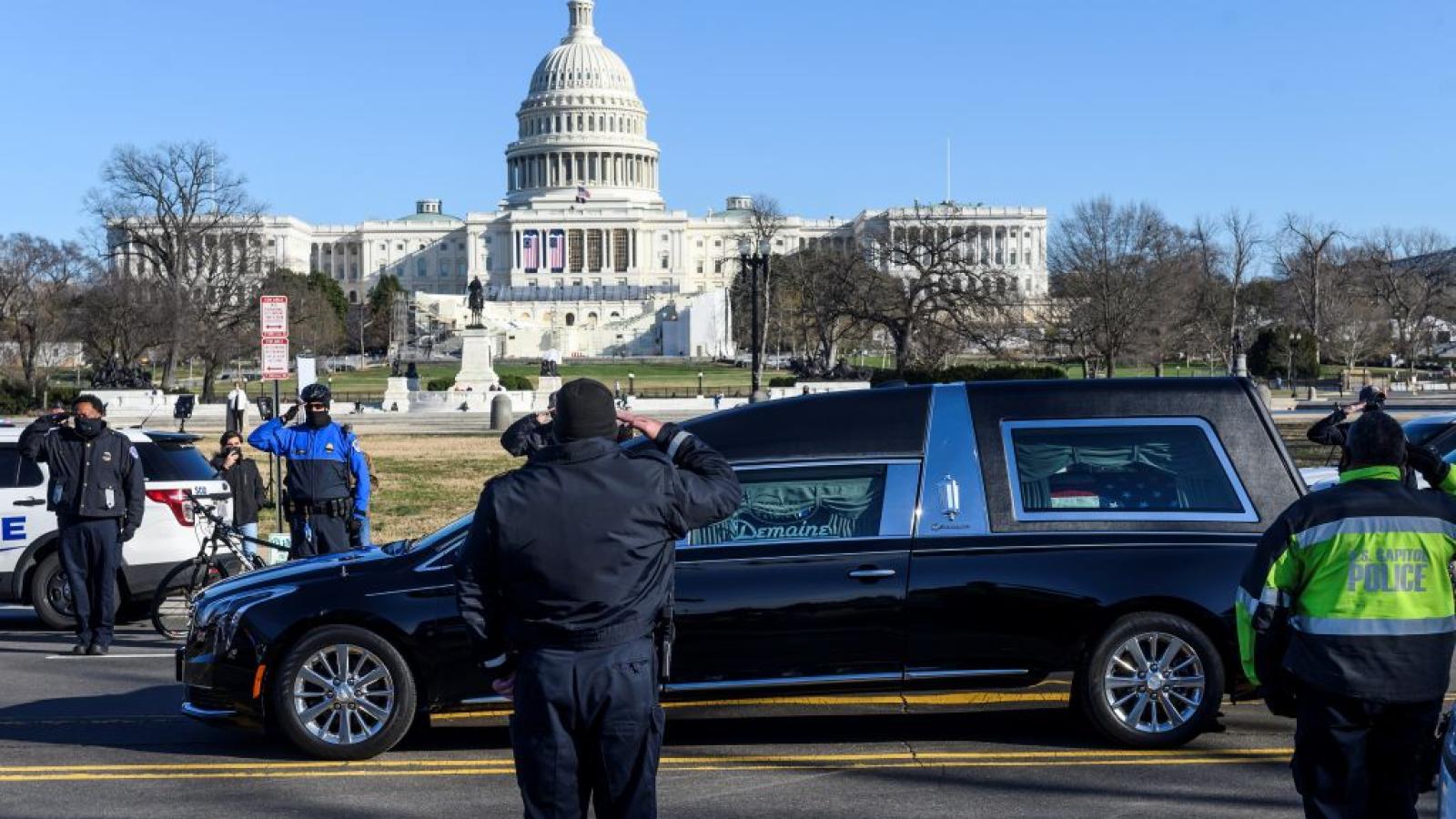 US Capitol Police salute as casket of Brian Sicknick passes on Jan. 10, 2021