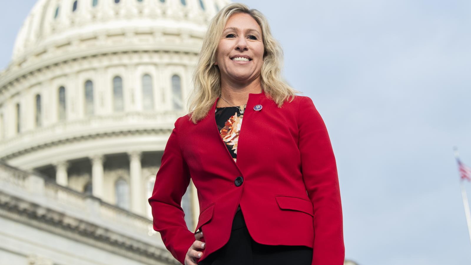 Rep. Marjorie Taylor Greene, R-Ga., is seen during a group photo with freshmen members of the House Republican Conference on the House steps of the Capitol on Monday, January 4, 2021.