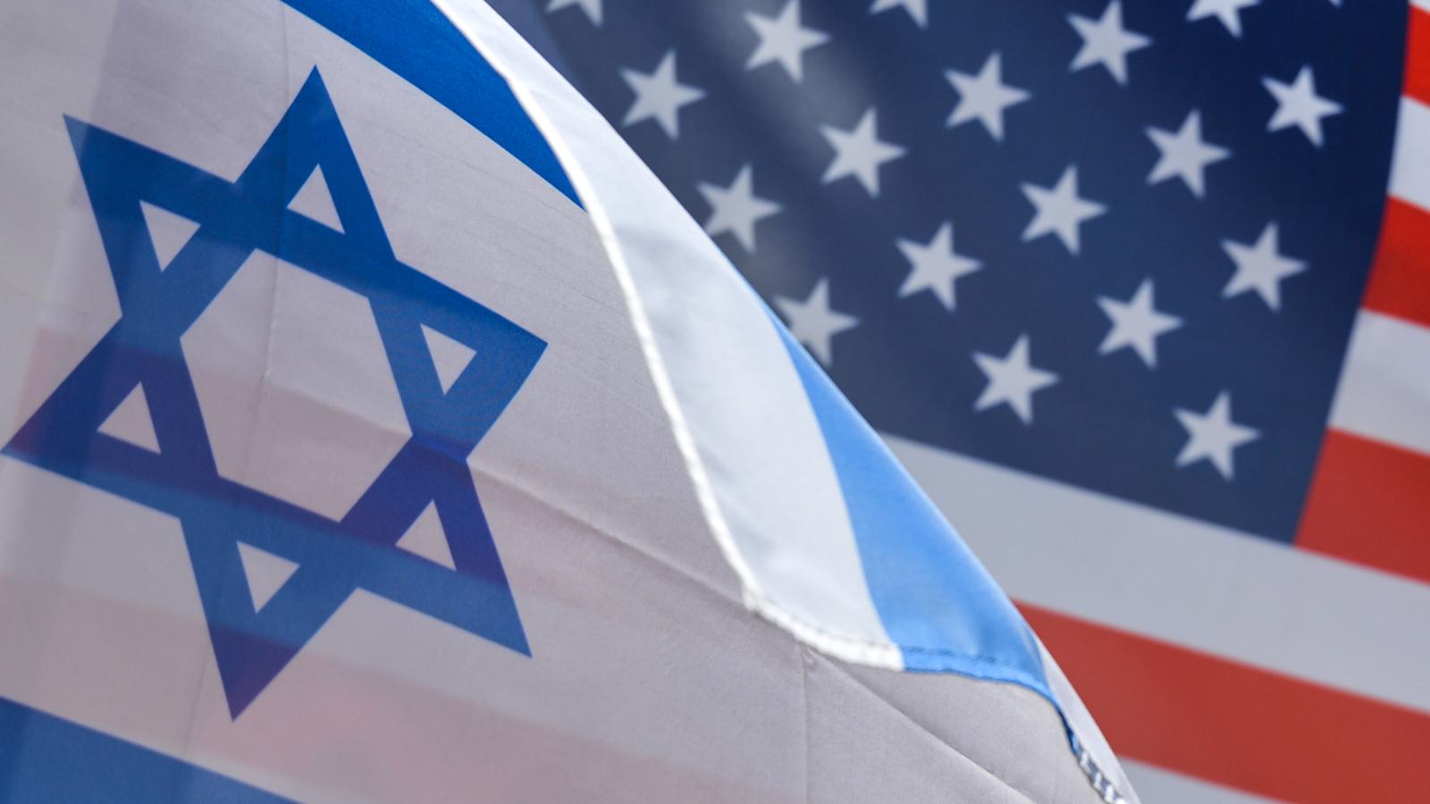 An Israeli and U.S. flags seen in Krakow's Center.