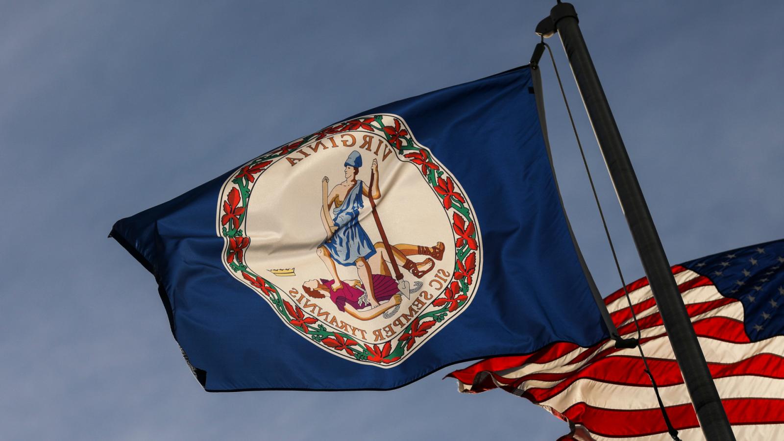 Virginia's state flag waves Sic Semper Tyrannis