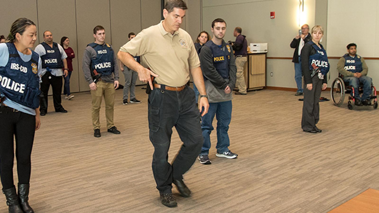 IRS supervisory special agent Rob Erickson, Stockton University students, Oct. 30, 2017, Galloway, N.J.