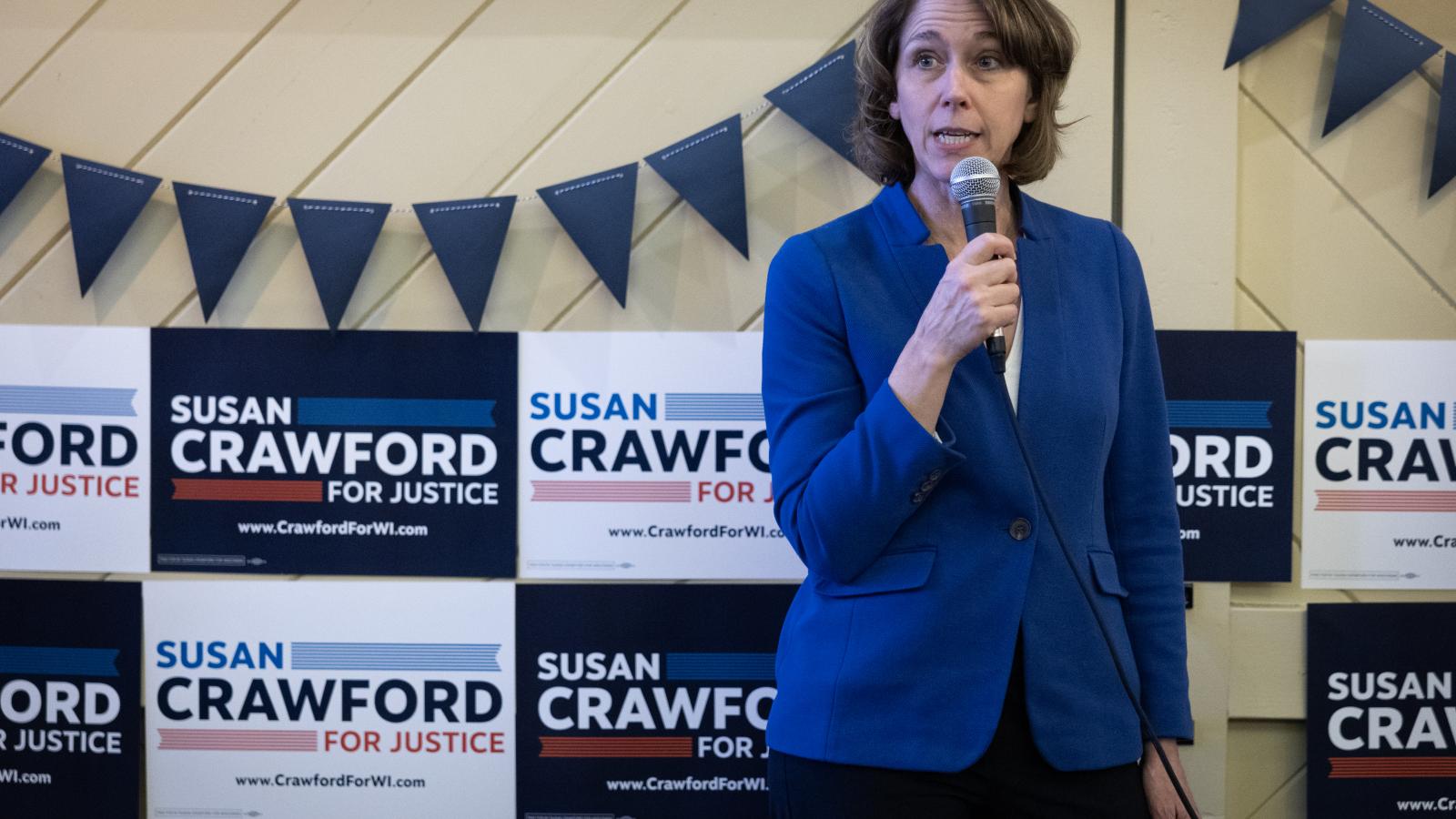 Dane County Circuit Court Judge Susan Crawford, candidate for the Wisconsin Supreme Court, speaks to supporters during a campaign stop at the Racine County Democratic Party headquarters on March 23, 2025 in Racine, Wisconsin.