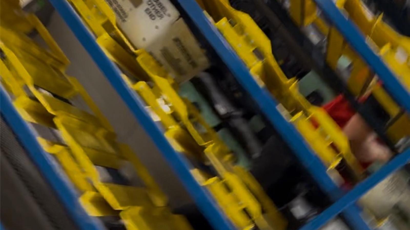 2024 election ballots on a shelf in Runbeck warehouse.