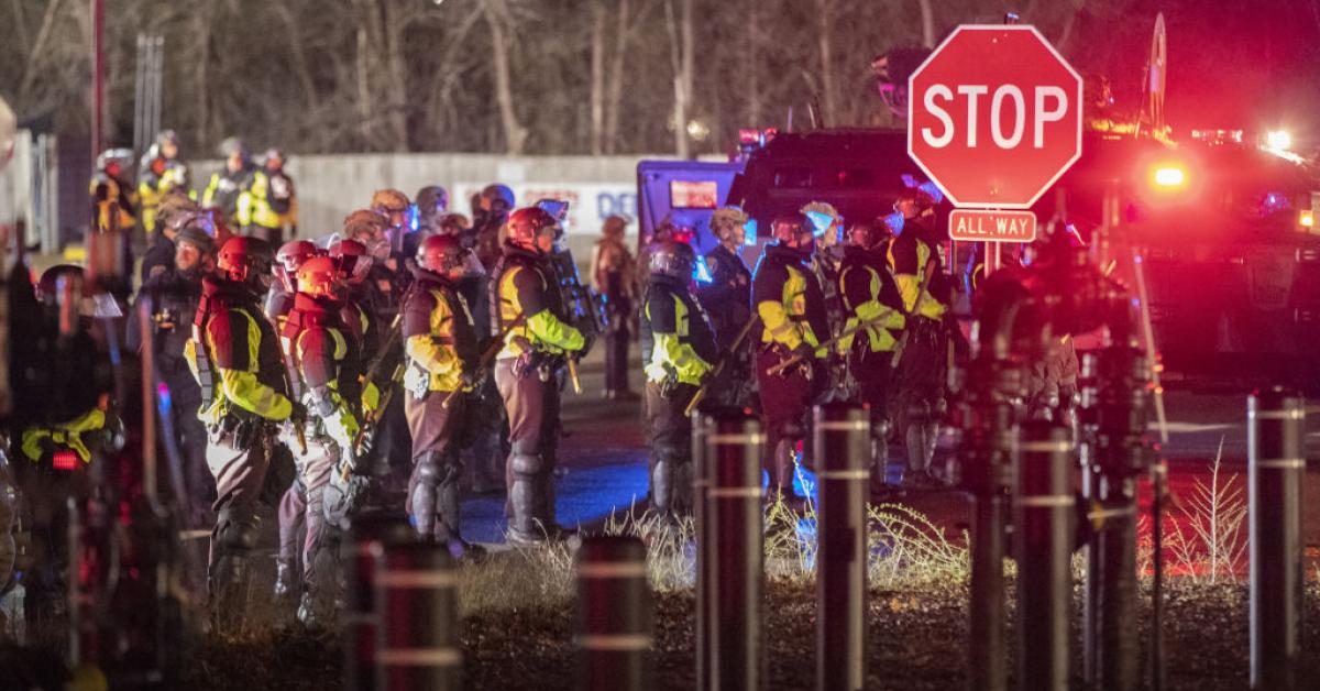 Protests erupt for second night after fatal police shooting in