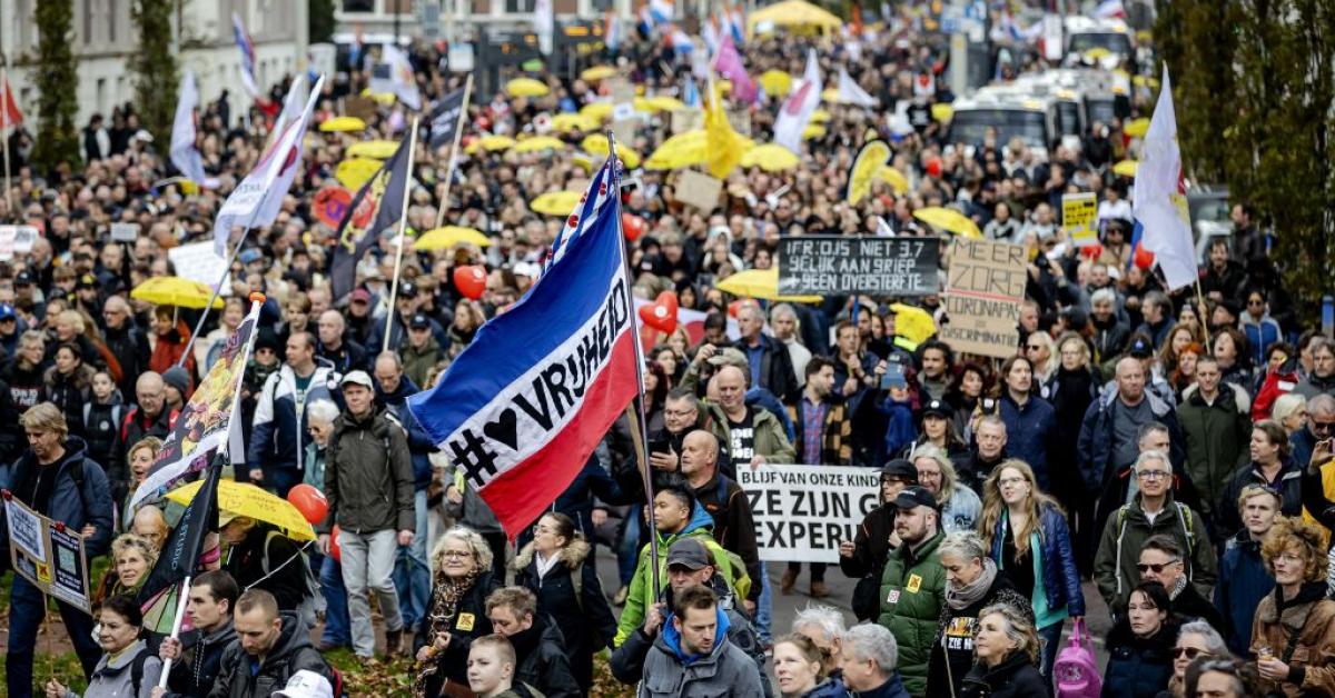 In The Netherlands, 20,000 people protest return of masking, widespread ...