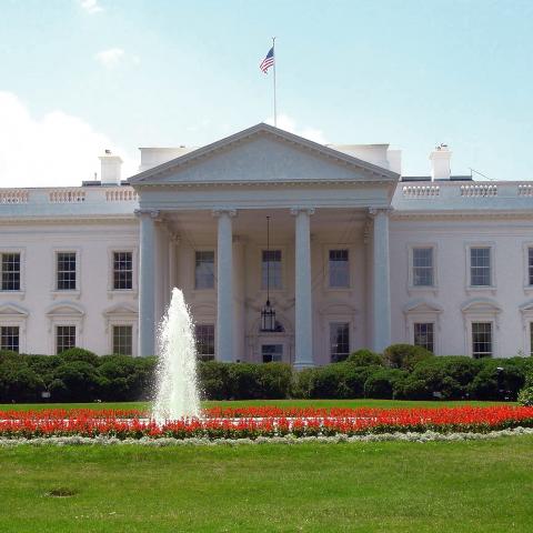 Crowd gathers outside White House in response to events in Afghanistan, while Biden is on vacation