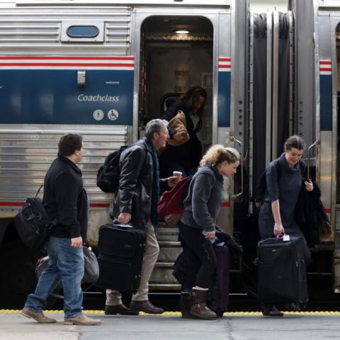 Travelers board an Amtrak train in Nov. of 2019