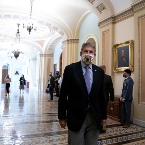 Senate prospects bleak for Democrats' voting bill, as Pelosi omits changes sought by Manchin