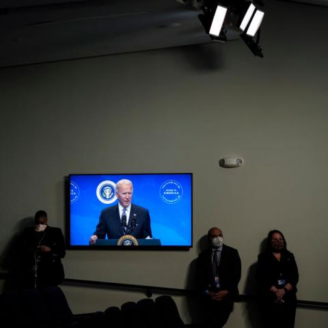 Joe Biden on a TV screen, Jan. 25