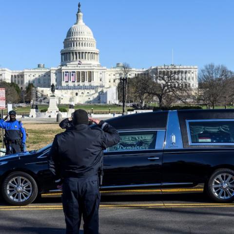 US Capitol Police salute as casket of Brian Sicknick passes on Jan. 10, 2021