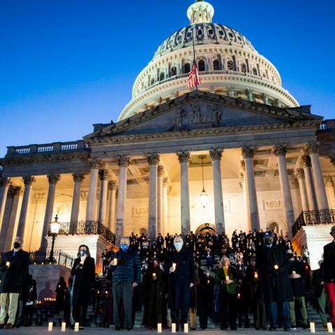 Members of Congress at candlelight ceremony on Feb. 23, 2021