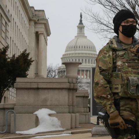 A National Guard soldier stands watch near the U.S. Capitol