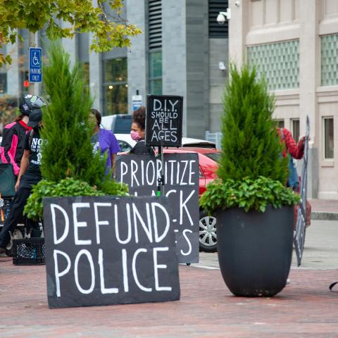 Demonstrators hold up signs in protest at the Hamilton County Courthouse following the Breonna Taylor decision earlier in the day in Louisville, Kentucky, Wednesday, September 23rd, 2020, in Cincinnati, Ohio, United States.