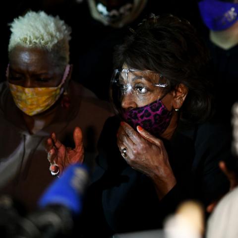 Rep. Maxine Waters joins demonstrators outside Brooklyn Center police station on April 17, 2021 in Minnesota