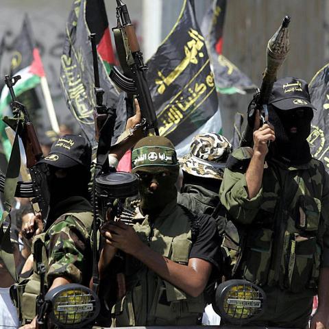 Islamic Jihad militants march