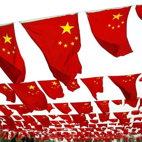 Chinese people visit a national flag show in China in 2006