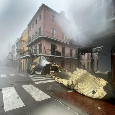 A section of a building's roof is seen after being blown off during rain and winds in the French Quarter of New Orleans, Louisiana on August 29, 2021 during Hurricane Ida
