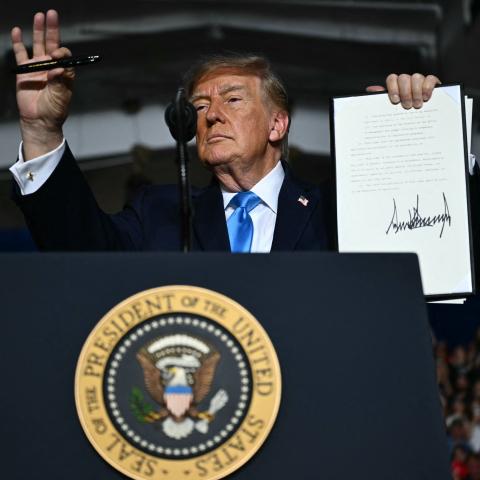 President Donald Trump signs executive order to bring down diesel costs during Nebraska rally