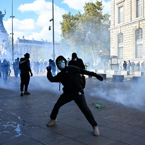 Protestors in French cities clash with police, break windows, block roads